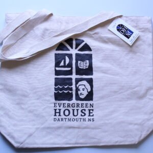 photo of an off-white canvas tote bag with a black and white screen printed design and the text Evergreen House Dartmouth NS